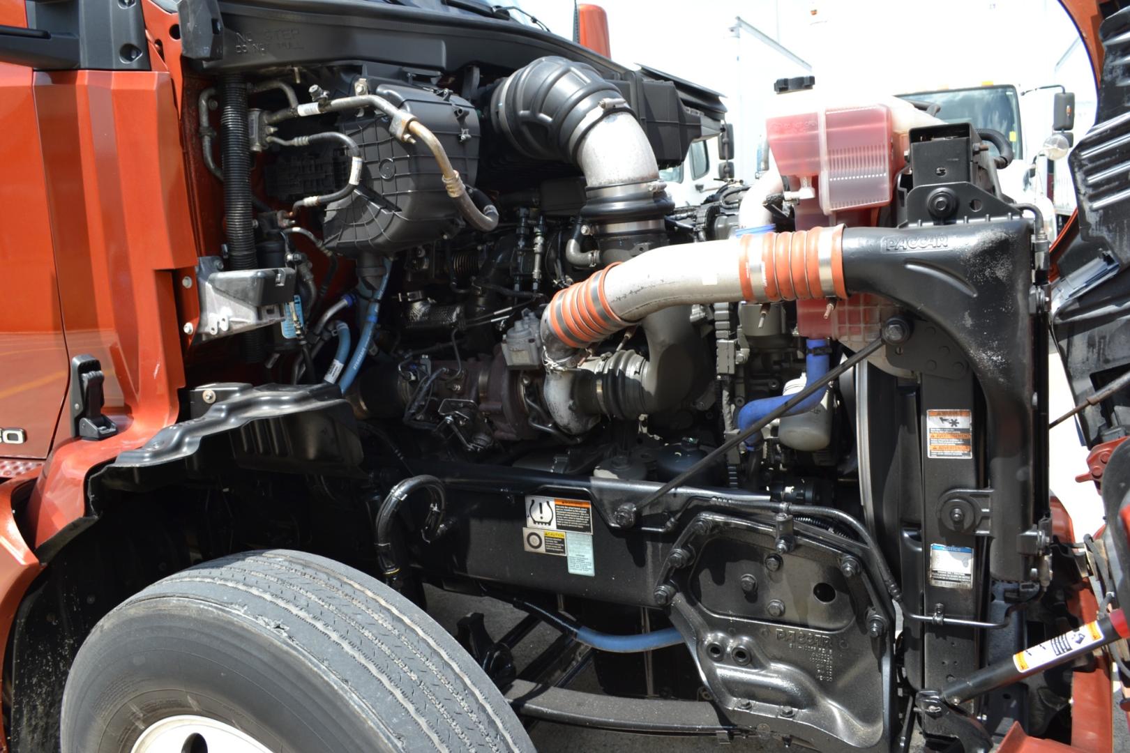 2020 ORANGE /BLACK KENWORTH T680 with an PACCAR MX13 12.9L 455HP engine, PACCAR PO-16F112C 12SPD AUTOMATED transmission, located at 9172 North Fwy, Houston, TX, 77037, (713) 910-6868, 29.887470, -95.411903 - Photo#11